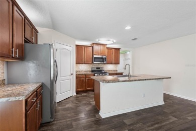 Welcome to this meticulously maintained 4-bedroom, 2-bath on Grand Reserve Golf Course in Florida - for sale on GolfHomes.com, golf home, golf lot
