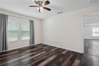 Welcome to this meticulously maintained 4-bedroom, 2-bath on Grand Reserve Golf Course in Florida - for sale on GolfHomes.com, golf home, golf lot