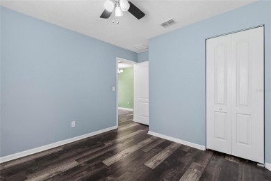 Welcome to this meticulously maintained 4-bedroom, 2-bath on Grand Reserve Golf Course in Florida - for sale on GolfHomes.com, golf home, golf lot