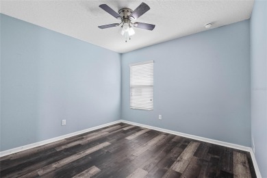 Welcome to this meticulously maintained 4-bedroom, 2-bath on Grand Reserve Golf Course in Florida - for sale on GolfHomes.com, golf home, golf lot