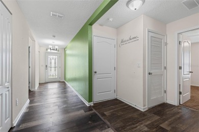 Welcome to this meticulously maintained 4-bedroom, 2-bath on Grand Reserve Golf Course in Florida - for sale on GolfHomes.com, golf home, golf lot