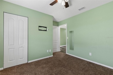 Welcome to this meticulously maintained 4-bedroom, 2-bath on Grand Reserve Golf Course in Florida - for sale on GolfHomes.com, golf home, golf lot