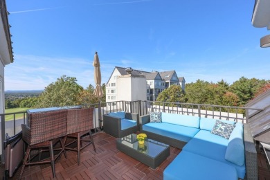 Penthouse living at its finest! This rare two-story home on the on Sky Meadow Country Club in New Hampshire - for sale on GolfHomes.com, golf home, golf lot