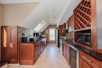 Penthouse living at its finest! This rare two-story home on the on Sky Meadow Country Club in New Hampshire - for sale on GolfHomes.com, golf home, golf lot