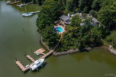 This waterfront property promises serene privacy for the home on The Tartan Course in Virginia - for sale on GolfHomes.com, golf home, golf lot