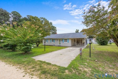 A short walk from the striking Piankatank River, this charming on Piankatank River Golf Club in Virginia - for sale on GolfHomes.com, golf home, golf lot