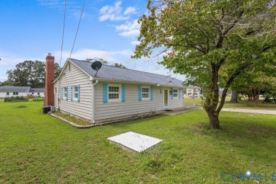 A short walk from the striking Piankatank River, this charming on Piankatank River Golf Club in Virginia - for sale on GolfHomes.com, golf home, golf lot