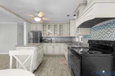 A short walk from the striking Piankatank River, this charming on Piankatank River Golf Club in Virginia - for sale on GolfHomes.com, golf home, golf lot