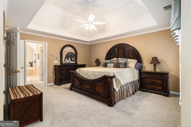 Welcome to your dream home in the prestigious Woodmont Golf and on Woodmont Golf and Country Club in Georgia - for sale on GolfHomes.com, golf home, golf lot