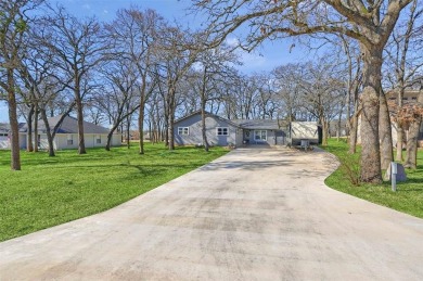 This house is a must see! A beautiful golf course view on a on Lake Kiowa Golf Course in Texas - for sale on GolfHomes.com, golf home, golf lot