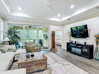 Pool home Alert! Welcome to paradise in this sought-after Key on LPGA International Golf Course in Florida - for sale on GolfHomes.com, golf home, golf lot