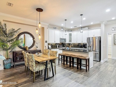 Pool home Alert! Welcome to paradise in this sought-after Key on LPGA International Golf Course in Florida - for sale on GolfHomes.com, golf home, golf lot