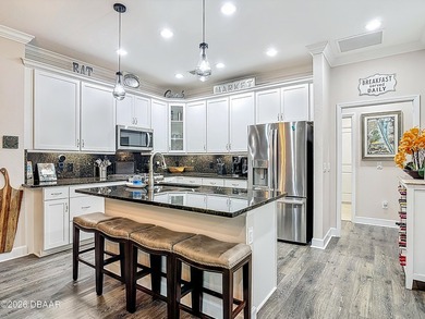 Pool home Alert! Welcome to paradise in this sought-after Key on LPGA International Golf Course in Florida - for sale on GolfHomes.com, golf home, golf lot