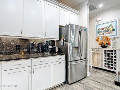 Pool home Alert! Welcome to paradise in this sought-after Key on LPGA International Golf Course in Florida - for sale on GolfHomes.com, golf home, golf lot