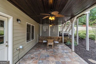 Welcome to your dream home in the prestigious Woodmont Golf and on Woodmont Golf and Country Club in Georgia - for sale on GolfHomes.com, golf home, golf lot