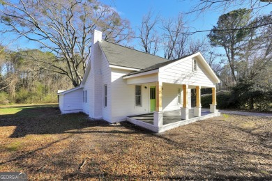 Location Location Location!  This three bedroom 2 bath farmhouse on Hickory Hills Golf Course in Georgia - for sale on GolfHomes.com, golf home, golf lot