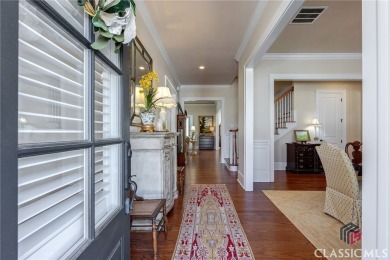 An Oconee gem featuring the popular Rossmoor floor plan which on The Georgia Club in Georgia - for sale on GolfHomes.com, golf home, golf lot