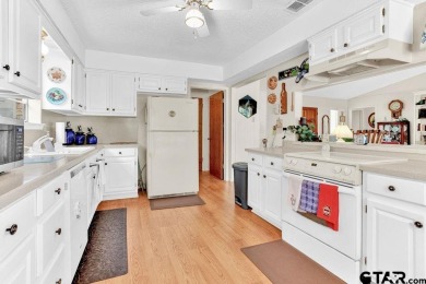 Lovely home close to park and swimming pool, offering a great on Hide-A-Way Lake Golf Course in Texas - for sale on GolfHomes.com, golf home, golf lot