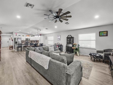 Welcome to this beautifully maintained 3-bedroom, 2-bath CBS on Spanish Lakes Country Club in Florida - for sale on GolfHomes.com, golf home, golf lot