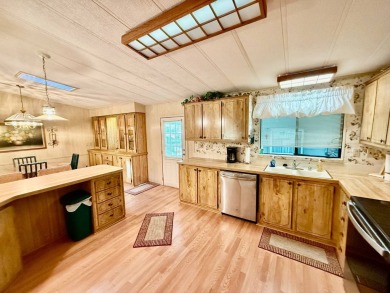 Home is located in Water Oak Country Club Estates in Lady Lake on Water Oak Country Club Estates in Florida - for sale on GolfHomes.com, golf home, golf lot