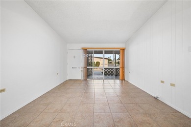 Freshly painted and beautifully refreshed, this inviting on Leisure World Seal Beach Golf Course in California - for sale on GolfHomes.com, golf home, golf lot