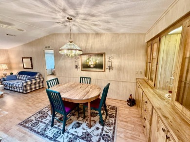 Home is located in Water Oak Country Club Estates in Lady Lake on Water Oak Country Club Estates in Florida - for sale on GolfHomes.com, golf home, golf lot