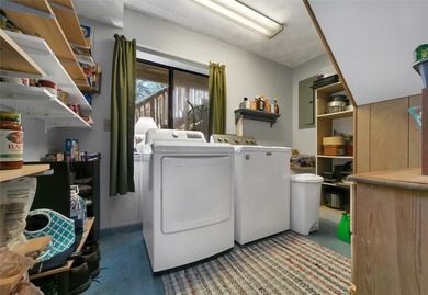 Nestled on 2.3 private wooded acres in the highly sought-after on Connestee Falls Golf Club in North Carolina - for sale on GolfHomes.com, golf home, golf lot