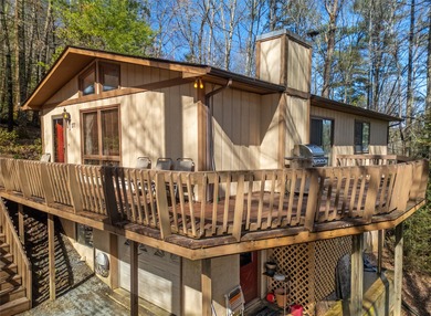 Nestled on 2.3 private wooded acres in the highly sought-after on Connestee Falls Golf Club in North Carolina - for sale on GolfHomes.com, golf home, golf lot