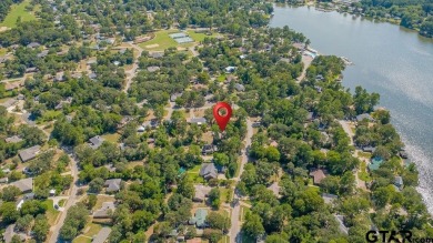 Lovely home close to park and swimming pool, offering a great on Hide-A-Way Lake Golf Course in Texas - for sale on GolfHomes.com, golf home, golf lot