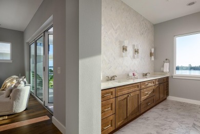 Brand New luxury construction, enjoy true waterfront living with on Oak Harbor Country Club in Florida - for sale on GolfHomes.com, golf home, golf lot
