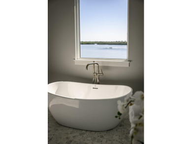 Brand New luxury construction, enjoy true waterfront living with on Oak Harbor Country Club in Florida - for sale on GolfHomes.com, golf home, golf lot