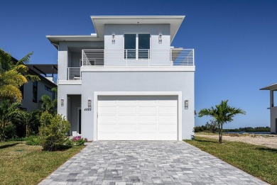 Brand New luxury construction, enjoy true waterfront living with on Oak Harbor Country Club in Florida - for sale on GolfHomes.com, golf home, golf lot