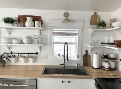 Nestled in a charming RV resort community in Mesa, this 1-bed on Apache Wells Country Club in Arizona - for sale on GolfHomes.com, golf home, golf lot