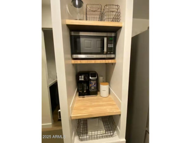 Nestled in a charming RV resort community in Mesa, this 1-bed on Apache Wells Country Club in Arizona - for sale on GolfHomes.com, golf home, golf lot
