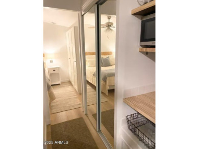 Nestled in a charming RV resort community in Mesa, this 1-bed on Apache Wells Country Club in Arizona - for sale on GolfHomes.com, golf home, golf lot