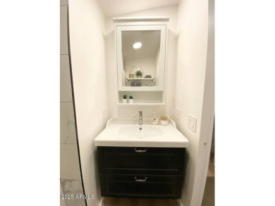 Nestled in a charming RV resort community in Mesa, this 1-bed on Apache Wells Country Club in Arizona - for sale on GolfHomes.com, golf home, golf lot