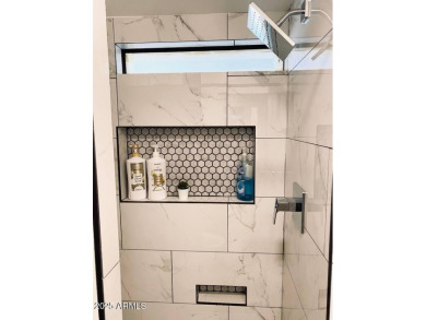 Nestled in a charming RV resort community in Mesa, this 1-bed on Apache Wells Country Club in Arizona - for sale on GolfHomes.com, golf home, golf lot