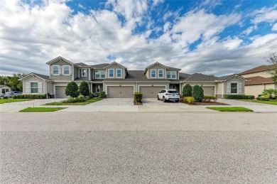 Absolutely stunning and very well-maintained townhouse at on Esplanade Golf and Country at Lakewood Ranch in Florida - for sale on GolfHomes.com, golf home, golf lot