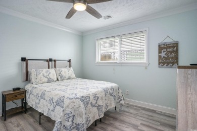 This fully furnished, turn-key 3-bedroom, 2-bath home with No on Tidewater Golf Club and Plantation in South Carolina - for sale on GolfHomes.com, golf home, golf lot