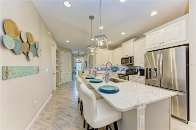 Absolutely stunning and very well-maintained townhouse at on Esplanade Golf and Country at Lakewood Ranch in Florida - for sale on GolfHomes.com, golf home, golf lot