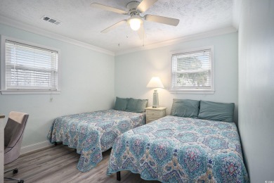 This fully furnished, turn-key 3-bedroom, 2-bath home with No on Tidewater Golf Club and Plantation in South Carolina - for sale on GolfHomes.com, golf home, golf lot