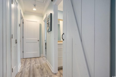 This fully furnished, turn-key 3-bedroom, 2-bath home with No on Tidewater Golf Club and Plantation in South Carolina - for sale on GolfHomes.com, golf home, golf lot