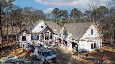 Introducing a New Construction luxurious custom home nestled in on Reynolds Lake Oconee - The Oconee in Georgia - for sale on GolfHomes.com, golf home, golf lot