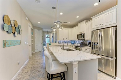 Absolutely stunning and very well-maintained townhouse at on Esplanade Golf and Country at Lakewood Ranch in Florida - for sale on GolfHomes.com, golf home, golf lot