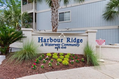 Welcome to 4520 Coquina Harbour Drive, a move-in ready gem on Harbour View Par 3 and Driving Range in South Carolina - for sale on GolfHomes.com, golf home, golf lot