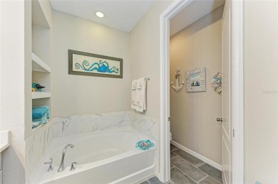Absolutely stunning and very well-maintained townhouse at on Esplanade Golf and Country at Lakewood Ranch in Florida - for sale on GolfHomes.com, golf home, golf lot