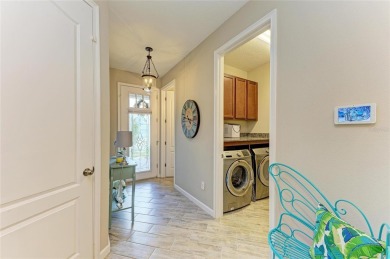Absolutely stunning and very well-maintained townhouse at on Esplanade Golf and Country at Lakewood Ranch in Florida - for sale on GolfHomes.com, golf home, golf lot
