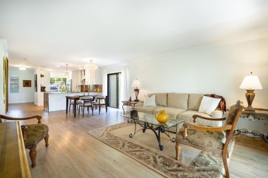 Experience effortless living in this light-filled first-floor on Boca Lago Golf and Country Club in Florida - for sale on GolfHomes.com, golf home, golf lot