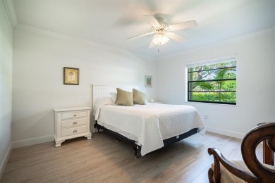 Experience effortless living in this light-filled first-floor on Boca Lago Golf and Country Club in Florida - for sale on GolfHomes.com, golf home, golf lot