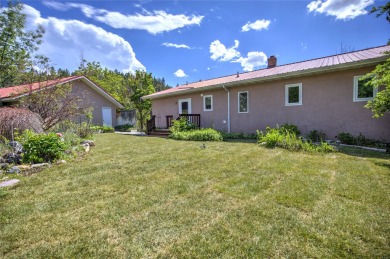 An oasis on the hill overlooks the lush climbing landscapes of on Norwegian Wood Golf Course in Montana - for sale on GolfHomes.com, golf home, golf lot